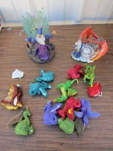 lot 78 image: Various paper Mache dragons, Wizard dcor, Dragon and wizard votive candle holder dcor