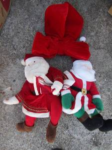 lot 87 image: Santas qty 2 stuffed and a large red bow