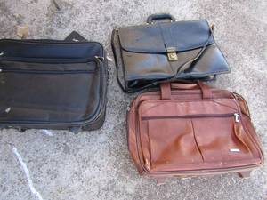 lot 88 image: Black rolling computer bags office bag, and a brown computer rolling bag all used in good condition