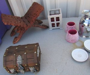 lot 92 image: Vintage wooden jewelry box, various porcelain coasters, silver plate tea pot, candle holder