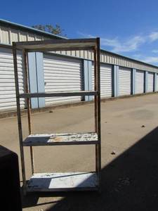 lot 98 image: 47 122510 metal outdoor shelf 4 tier, could use some touch up paint�