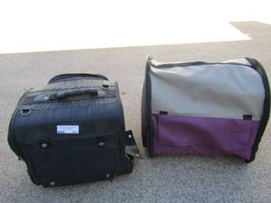 lot 101 image: Portable pet home qty 2, 1 is black 1 is purple, both great condition