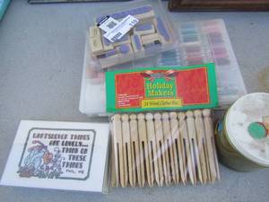 lot 110 image: needle thread case full, stamps, wood clip pins and more