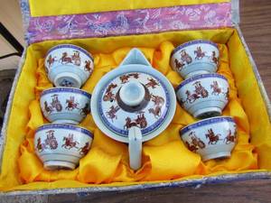 lot 112 image: Indian design tea pot set with 6 cups in original case