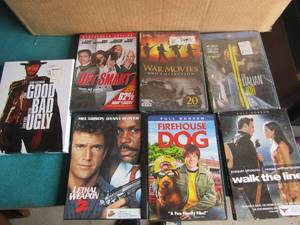 lot 133 image: large lot of dvd and vhs tapes new and used, look at pictures for titles