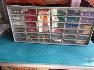 lot 134 image: 36 drawer storage container full of various beads