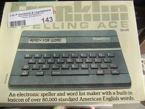 lot 143 image: Franklin spelling ace NIB spells outloud, Motorola deluxe vintage cellur phone in original box with paperwork and charger seems to be new