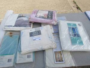 lot 167 image: Lot of New curtains, full size sheets and vinyl shower cutains all NIP
