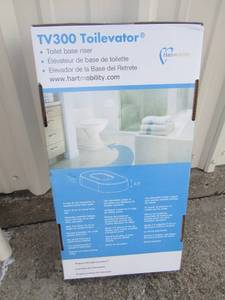 lot 169 image: Tv 300, Toilevator, lift to raise the commode from the bottom, NIB never used