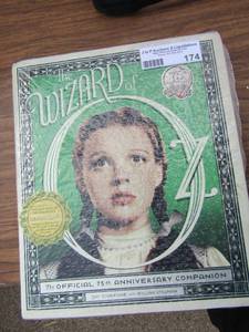 lot 174 image: The wizard of Oz book, 75th anniversary version, Still wrapped in original packing
