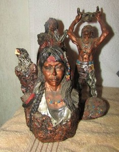 lot 11 image: 5 14 inch ceramic Indian women, 7 18 inch ceramic soldier Indian, 7 12 inch ceramic Indian man holding a bulls head