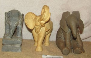 lot 13 image: African elephant calf Lenox 1991 5 14 inch, white glass elephant 6 12 inch, 5 14 inch elephent made out of stone