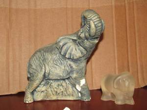 lot 21 image: 1993 spy frosted glass elephant, Genuine volcanic ash made elephant, By St. Helens sculptures