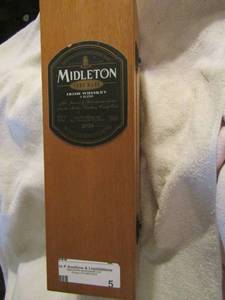 lot 5 image: Vintage Midleton irish whiskey bottle from 2004, in orginal wood box comes with paper work