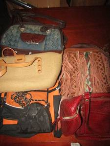 lot 34 image: Large lot of womens fashion purses and tote bags