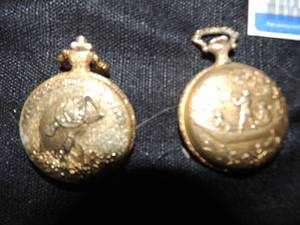 lot 191 image: 2 pocket watches large mouth bass pearl quartz and Dunham10 jewel