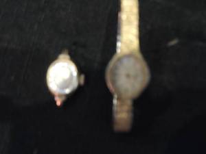 lot 192 image: 1 watch with wristband one without both gold