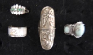 lot 3 image: Sterling rings x 4 -turquoise size 8.5, emerald color7, southwest knuckle ring 8, and solitary band 7