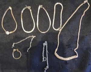 lot 81 image: 4 gold tone chain bracelets , one gold necklace with faux stones and 1 gold chain bracelets with blue stone