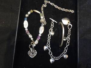 lot 90 image: 4 Silverstone bracelets