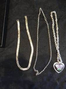 lot 89 image: 2 silver tone chains and one rose pendant heart necklace