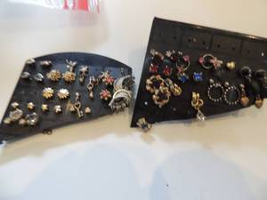 lot 61 image: 2 black display boards full of assorted pierced earrings
