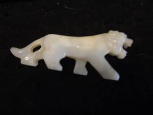 lot 64 image: carved white jade tiger 4.5 long
