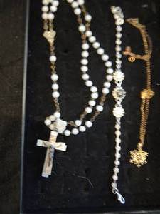 lot 68 image: rosary, stone bracelet and snowflake goldstone necklace