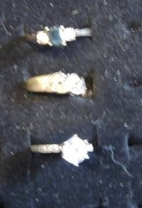 lot 59 image: 3 costume rings- band 5.5, solitaire is 6, and 3 the ring is 9.5