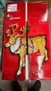 lot 262 image: Christmas Reindeer Outdoor Decoration 4.5ft LED by Home Accents (Complete in box)