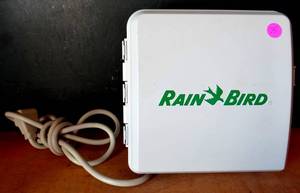 lot 75 image: Rain Bird SST1200O Simple To Set IndoorOutdoor Timer, 12-Zone - LIKE NEW