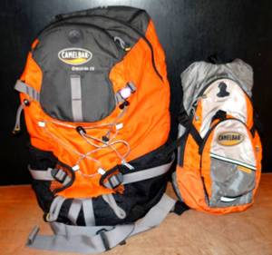 lot 102 image: LOT OF 2 - CAMELBACK ORANGE BACKPACKS AS SHOWN