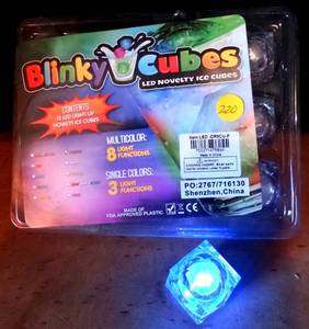 lot 220 image: BLINKY CUBES - SET OF 12 PURPLE FLASHING NOVELTY ICE CUBES (WATERPROOF)