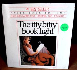 lot 303 image: THE ITTY BITTY BOOKLIGHT NEW IN BOX