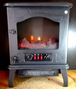 lot 387 image: PORTABLE FIREPLACE HEATER WITH ELECTRONIC FLAME - BLOWS GOOD HEAT (NO DOOR - AS IS) - WORKS
