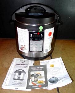 lot 390 image: Fagor 670041880 LUX Multi Cooker, 6 quart, Silver - WORKS (COSMETIC DENT ON RIGHT SIDE OF KEYPAD)