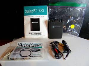 lot 418 image: STERLING TENS STIMULATING UNIT WITH ELECTRODES AND PADS