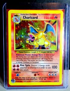 lot 435 image: AMAZING FIND - ULTRA BIG $ - THE COVETED 1995 POKEMON CHARIZARD HOLO CARD - NMMT