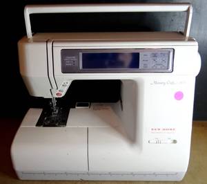 lot 521 image: New Home Janome Memory Craft 8000 Sewing Embroidery Machine $$$