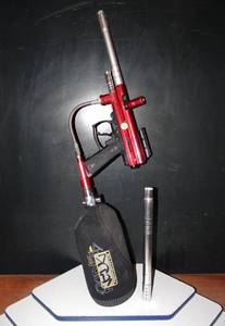 lot 330 image: Spyder Compact Java Edition 2-in-1 Red Paintball Marker w CO2