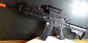 lot 353 image: Made in China M16 Rifle Bb Gun wScope - BLACK BODY