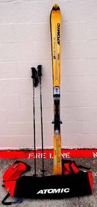 lot 551 image: BIG $ LOT - ATOMIC BETA RIDE 9.22 SNOW SKIS WMARKER LOGIC M92 TITANIUM BINDINGS & PAIR OF GOODE MILLENIUM SKI POLES (IN TRAVEL BAG)