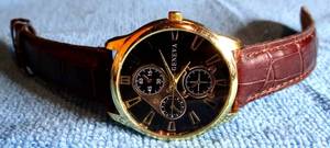 lot 589 image: ANOTHER GENEVA MANS WATCH WLEATHER BAND AS SHOWN