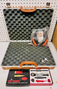 lot 26 image: Vintage Gun Guard Hard Shell Hand Gun Carrying Case W2 Keys, Lee Loader Complete Reloading Tool, &amp Silencio Advanced Hearing Peotectors