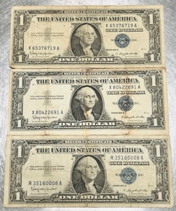 lot 42 image: Lot of 3 Series 1957 B One Dollar Silver Certificates W Blue Seal