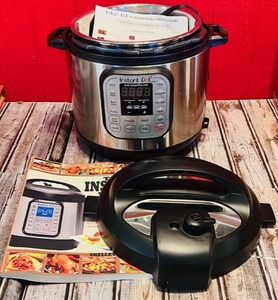 lot 11 image: Instant Pot IP-DUO6050 w Instructions &amp Cookbook