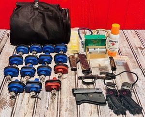 lot 49 image: Gun Parts &amp Assessories WTravelon Bag - Including 18 Gun Locks &amp Weaver Top Mount 63B for Marlins, Mossberg, and Western Field&nbsp