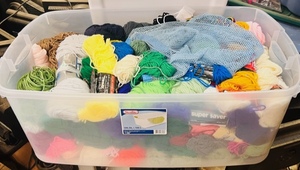 lot 190 image: 106Qt Sterilite Tote Filled with Yarn WLid