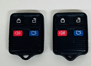 lot 222 image: Two (2) FordLincolnMercury 3B8L3T-15K601-AB OEM 3 Button Key Fobs