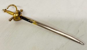 lot 249 image: Vintage Spanish Gold Tone Sword Letter Opener Engraved With Hilton &amp Castillana